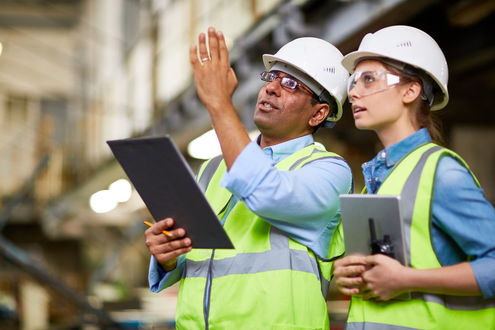 two workers at a construction site